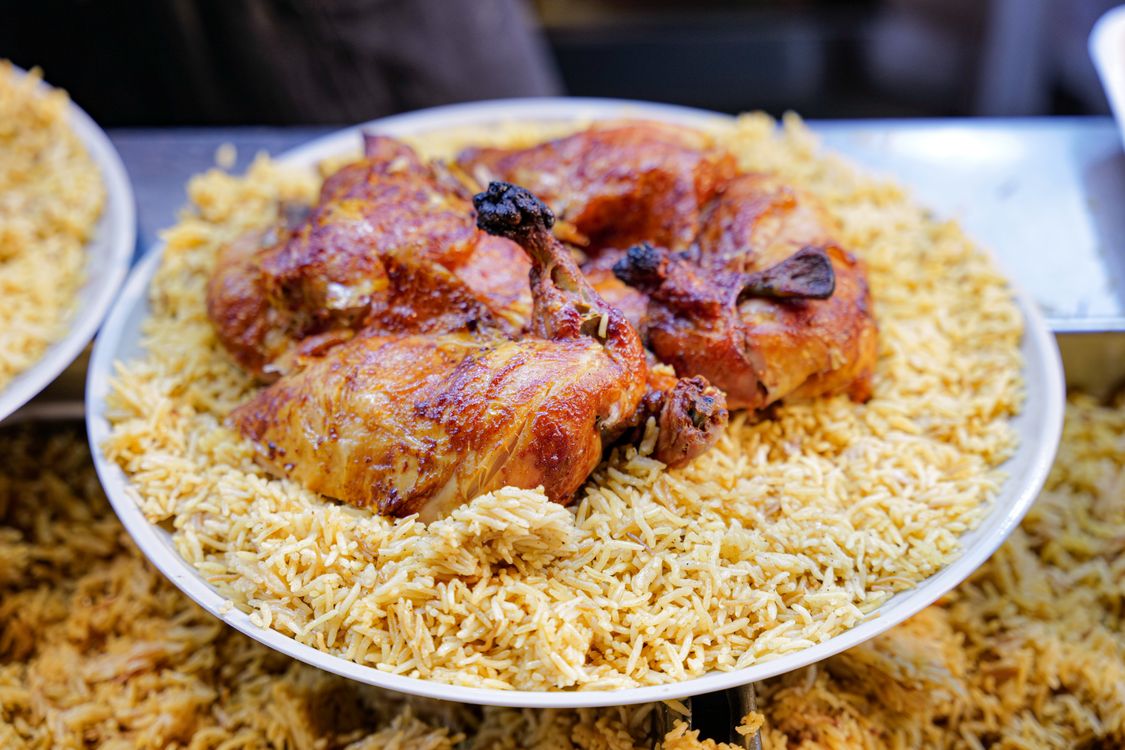 Roasted chicken served with rice