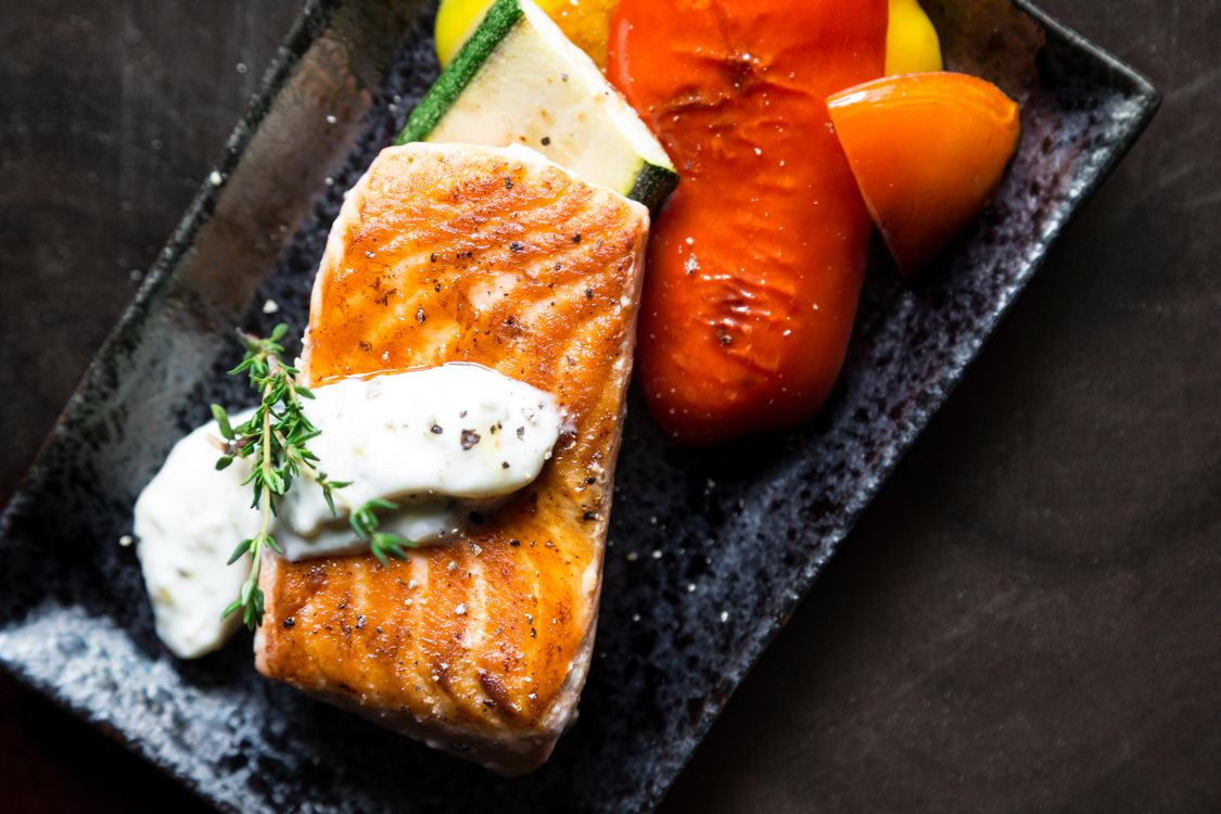 Grilled salmon with colorful vegetables